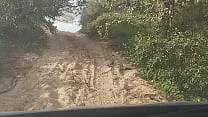 Guy of car spills a lot of milk on a trail near the sea