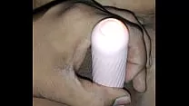 Wome satisfying with vibrator and anal plug