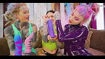 Two dominas gang up on Goth chick to fill her holes with toys and make her cum